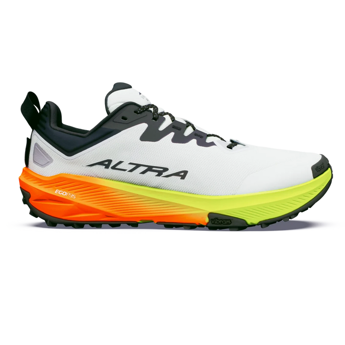 A white Altra trail running shoe with a black and gray upper, a bright orange and yellow midsole, and a black outsole, shown from a side profile on a white background.